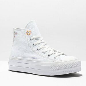 Converse white platform sneakers with flower details